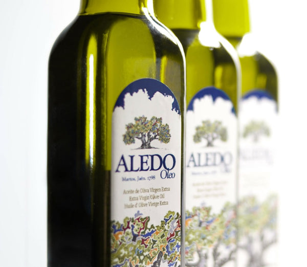500 cc bottle of Aledo Oil + metal jar 